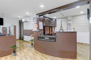 a view of the lobby of a townhouse with a reception desk at Townhouse Jalsa Resort in Goshainganj