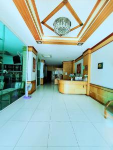 a large lobby with a waiting area and a waiting room at Fruit Paradise in Patong Beach