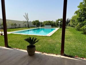 The swimming pool at or close to Botola Home 2