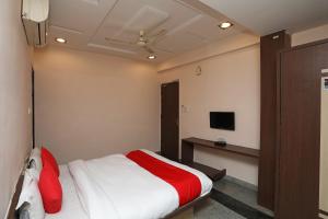 Katil atau katil-katil dalam bilik di OYO Hotel Emerald