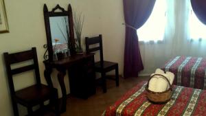 Postel nebo postele na pokoji v ubytování Kilim Hotel