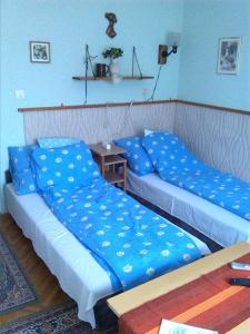 Cama o camas de una habitación en Alpesi Vendégház