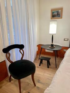 Postel nebo postele na pokoji v ubytování Residenza Radetzky
