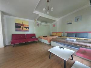 Posezení v ubytování Rayonghouse Resort