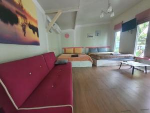 Posezení v ubytování Rayonghouse Resort