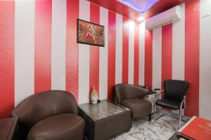 Posezení v ubytování Super Hotel O Aastha Near Chaudhary Charan Singh International Airport