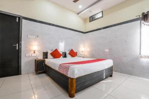 Postel nebo postele na pokoji v ubytování Super Hotel O Src Grand