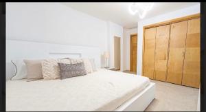 Postel nebo postele na pokoji v ubytování Marbella Juan dolio beach front luxury apartment + 13 fotografií
