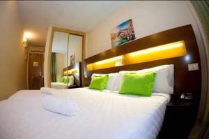 A bed or beds in a room at Hostal San Marcos