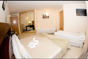 A television and/or entertainment centre at Hostal San Marcos
