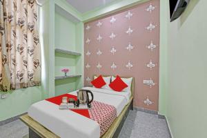 Posteľ alebo postele v izbe v ubytovaní Flagship Jmd Hotel