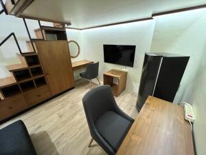 TV a/nebo společenská místnost v ubytování Choska Residence