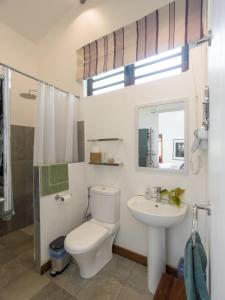 Ванная комната в Green Cottage Chamarel