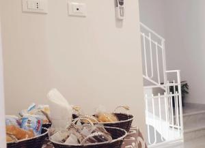 a group of baskets sitting on top of a table at Casa Villaggio Pirandello in Agrigento