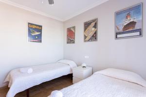 Posteľ alebo postele v izbe v ubytovaní Home2Book Ático Sotavento La Tejita, Pool