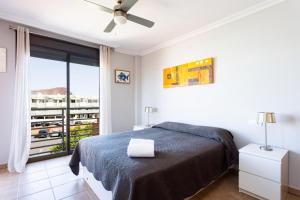 Posteľ alebo postele v izbe v ubytovaní Home2Book Ático Sotavento La Tejita, Pool