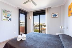 Posteľ alebo postele v izbe v ubytovaní Home2Book Ático Sotavento La Tejita, Pool