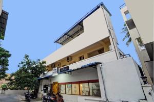 a view of the front of the building at Collection O Arn Guest House Near Chennai International Airport in Chennai