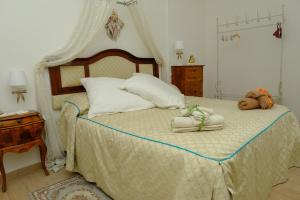 Posteľ alebo postele v izbe v ubytovaní Dimora di Adalia