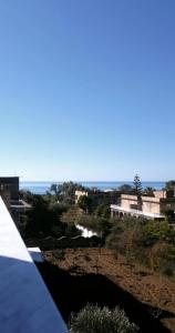 a view of the ocean from a roof at Casa Villaggio Pirandello in Agrigento