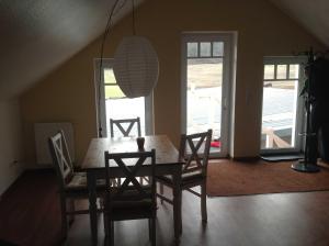 Posezení v ubytování Ferienwohnung Studiowohnung, offener Wohn- und Schlafber + 7 fotografií