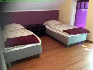 Postel nebo postele na pokoji v ubytování Ferienwohnung Studiowohnung, offener Wohn- und Schlafber