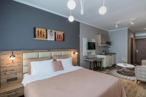 Ένα ή περισσότερα κρεβάτια σε δωμάτιο στο The Wilson Galata Hotel