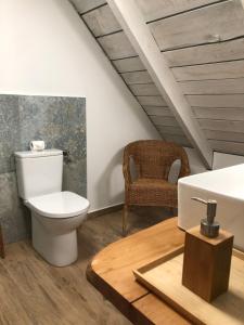 a bathroom with a toilet and a sink at Chata na Zielonym Wzgórzu in Garcz +67 photos