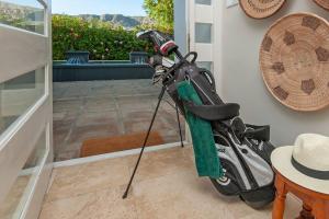 a motor scooter is parked in a room at Wild Waters at Kraal Rock on the cliffs in Hermanus in Hermanus