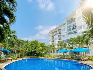 a view of the resort from the pool at Ben Tre Riverside Resort in Ben Tre