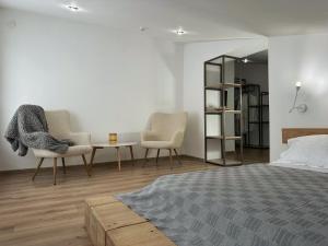 Postel nebo postele na pokoji v ubytování Higina Spa Hotel + 37 fotografií
