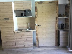 Η κουζίνα ή μικρή κουζίνα στο Le chalet au bord du lagon