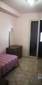 En eller flere senge i et værelse på Appartamento del PESCATORE vista mare