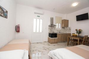 Kuchyň nebo kuchyňský kout v ubytování Zervakis Apartments