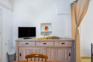 Μια τηλεόραση ή/και κέντρο ψυχαγωγίας στο Margaret's House by Rentbeat