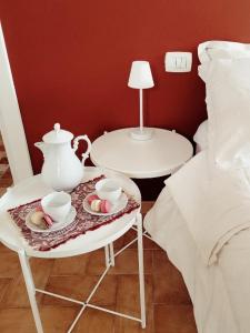 A bed or beds in a room at Audaces Resort