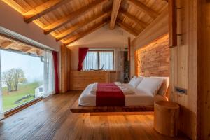 Säng eller sängar i ett rum på Casera Degnona