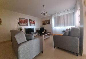 A television and/or entertainment centre at Sol Paraiso