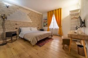 Postel nebo postele na pokoji v ubytování Aurelia Rooms