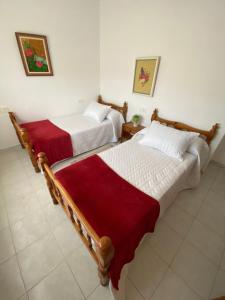 Postel nebo postele na pokoji v ubytování Casa Teresa