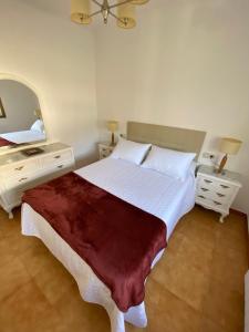 Postel nebo postele na pokoji v ubytování Casa Teresa