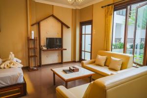 TV a/nebo společenská místnost v ubytování Family Hotel Gradia 2