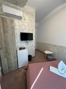 Postel nebo postele na pokoji v ubytování Hotel Minion