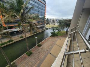 a view of a river from a balcony of a building at The Sails in Durban