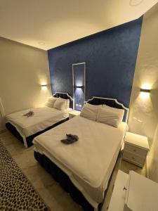 Voodi või voodid majutusasutuse Lucky Hostel toas