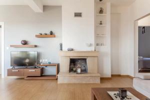 Galería fotográfica de Stelianas House Top Floor Apartment with Private Jacuzzi en Lygaria