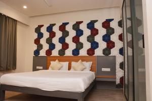 Postel nebo postele na pokoji v ubytování Hotel Sai Palkhi Niwara + 37 fotografií