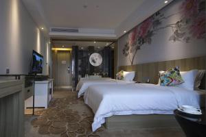 Paco Hotel Tianpingjia Metro Guangzhou - Free Shuttle Bus For Canton Fair客房内的一张或多张床位