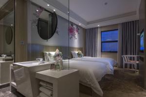 Paco Hotel Tianpingjia Metro Guangzhou - Free Shuttle Bus For Canton Fair客房内的一张或多张床位