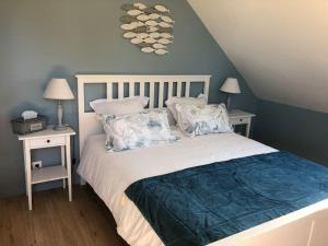 Posteľ alebo postele v izbe v ubytovaní CHEZ ROMY, MAISON AVEC PARKING ET JARDIN
